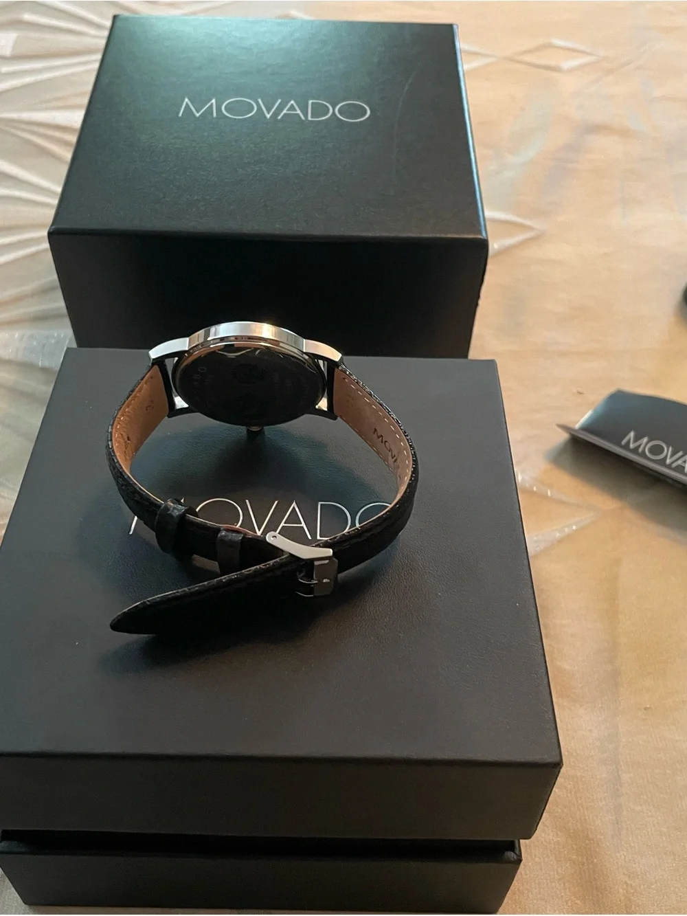 Movado Black Dial Silver Case Black Leather Strap Watch